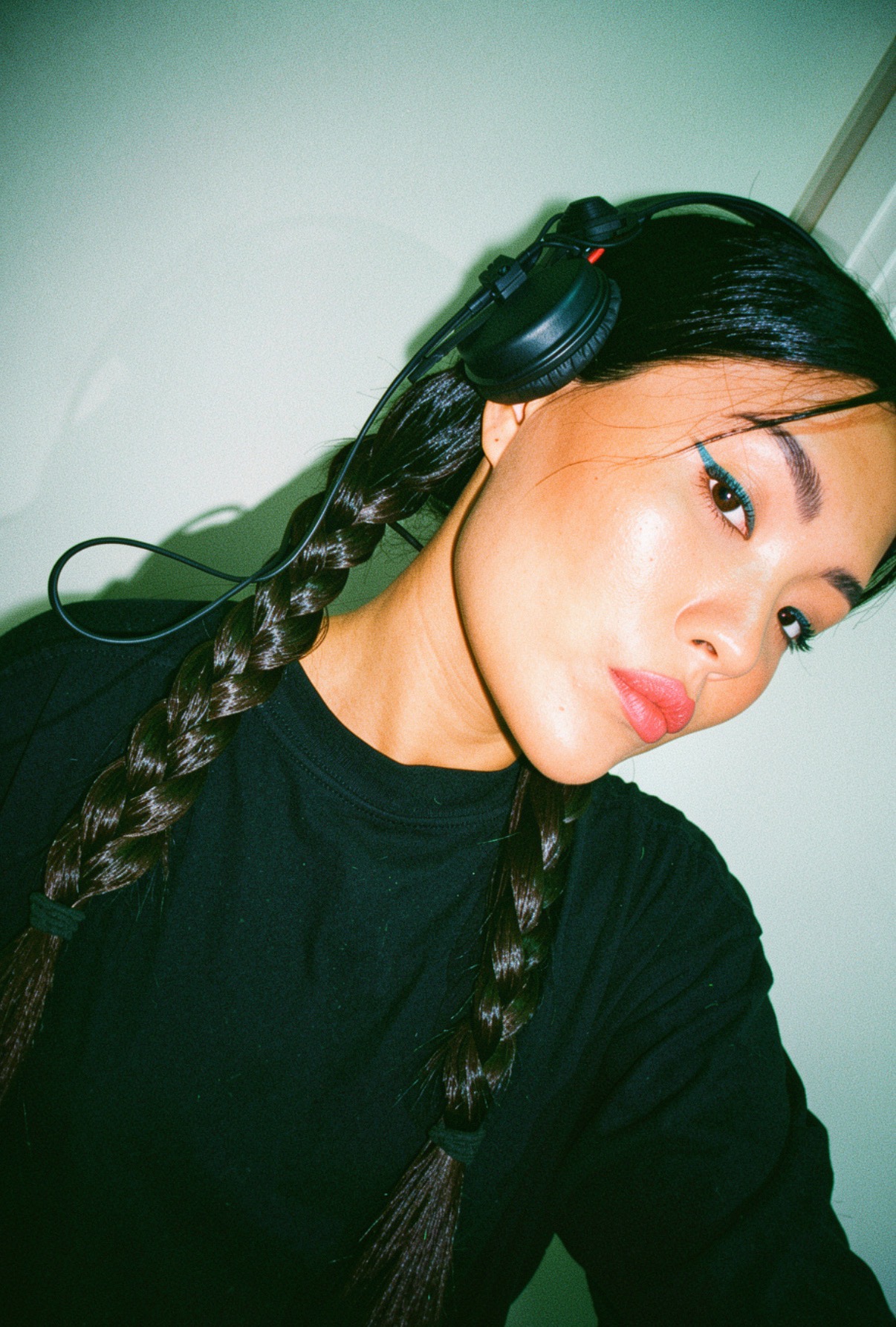 DJ Tianyu portrait with headphones